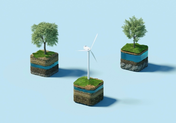 CSR: Duas árvores e uma turbina eólica em três cubos.