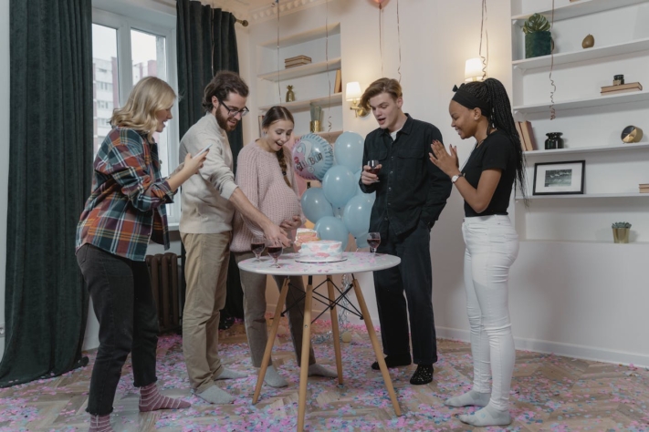 A gender reveal cake reveals the gender of the baby.