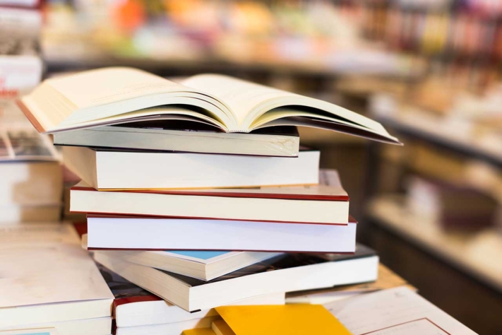 A stack of books, presorted for literature management.
