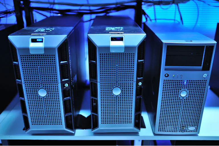 Servers in blue lighting.