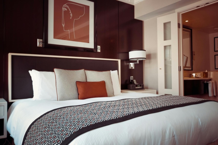 Travel expense report: A hotel room in earthy tones.