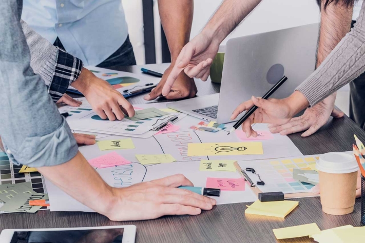 A team talks about a new SWOT analysis example.