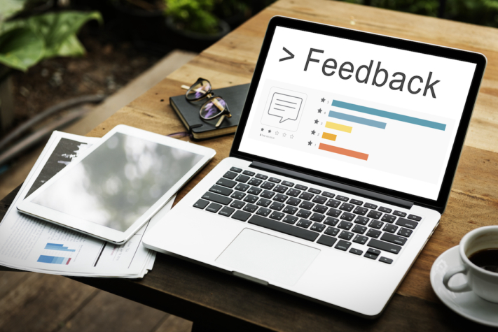 Create a survey: Laptop with feedback results